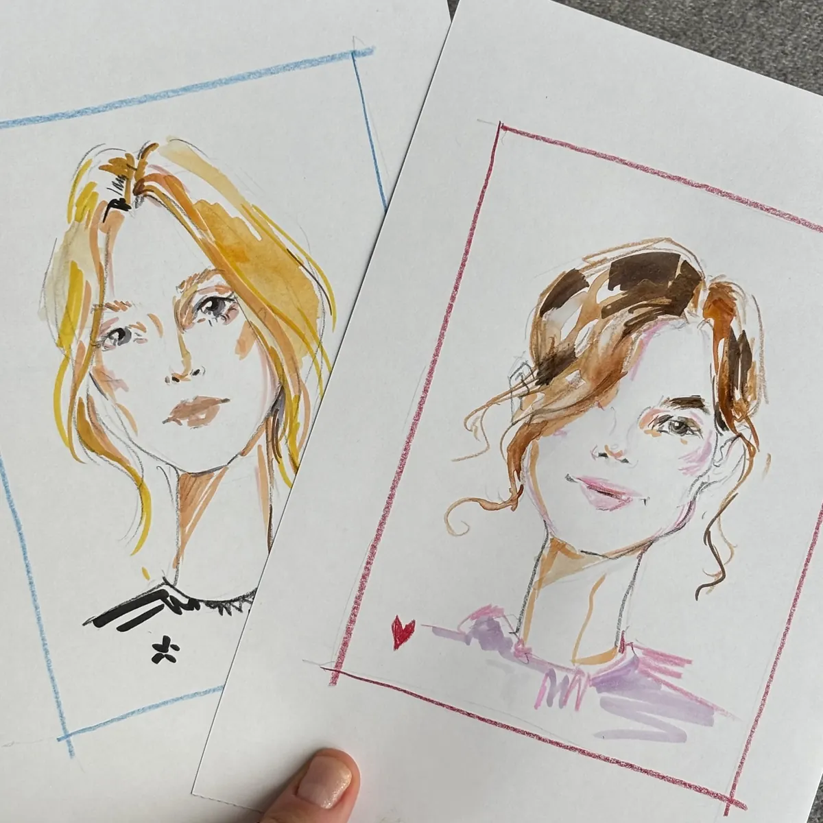 Two live portraits on paper, a blonde and a redhead